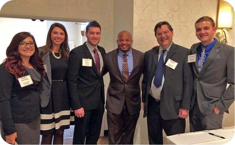 Students meet former NFL football player Gary Brackett